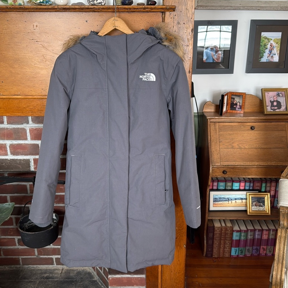North face parka. Gray. Size small. Brand new! Too small .